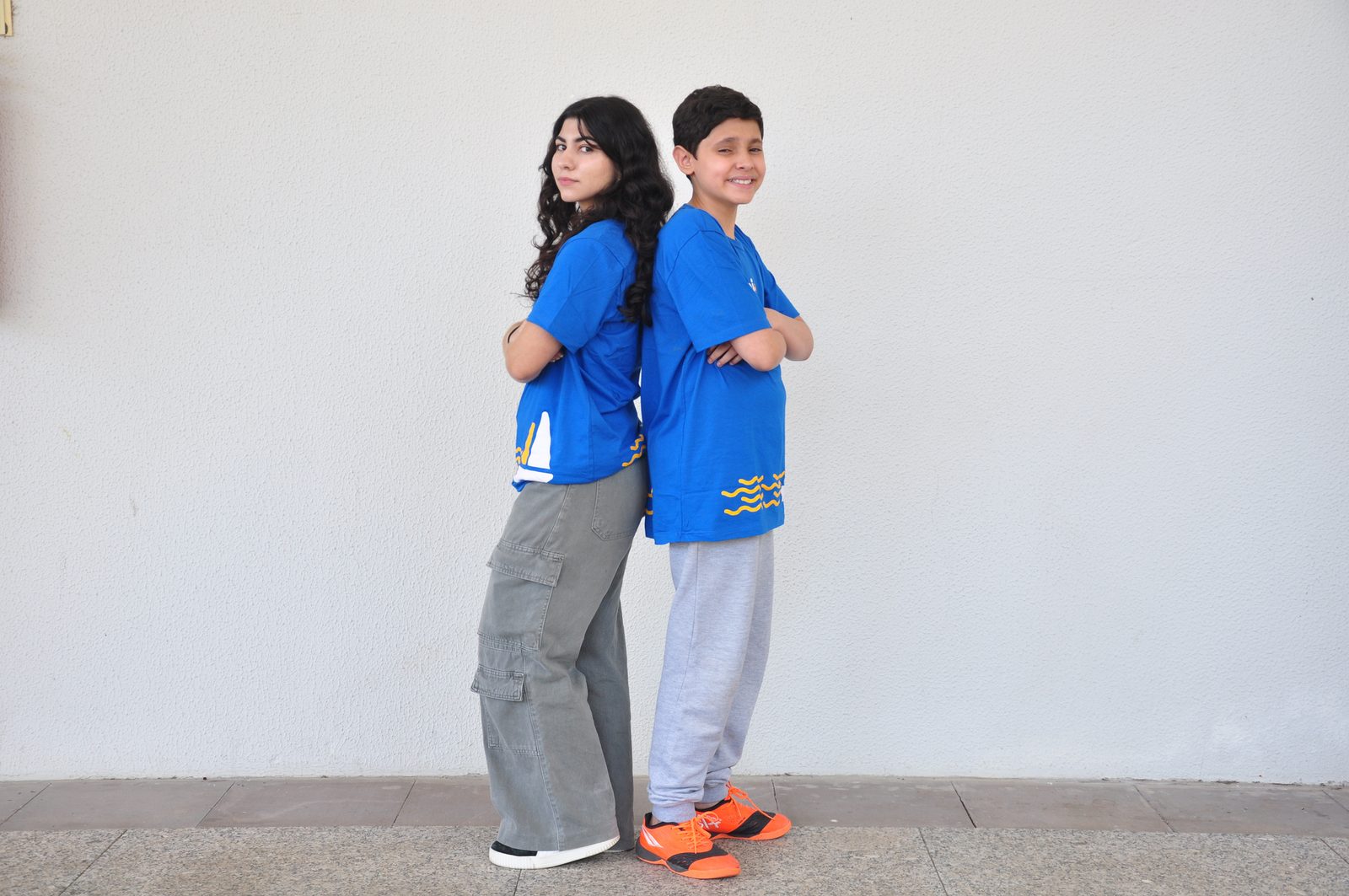 Dois adolescentes do programa Sabi+ lado a lado